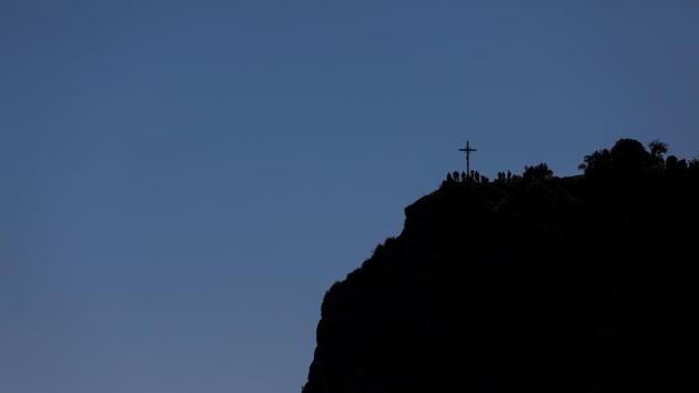 The cross of Saint Michael is seen in the surroundings of the Montserrat Abbey. Under Spanish law, victims of molestation cases that do not involve rape have five years after they have turned 18 to seek justice. More serious cases can be reported 15-20 years past the age of 18. Hurtado hopes to lift the initial threshold after which the statute of limitations kicks in to 50 from 18 years. (Susana Vera / REUTERS)