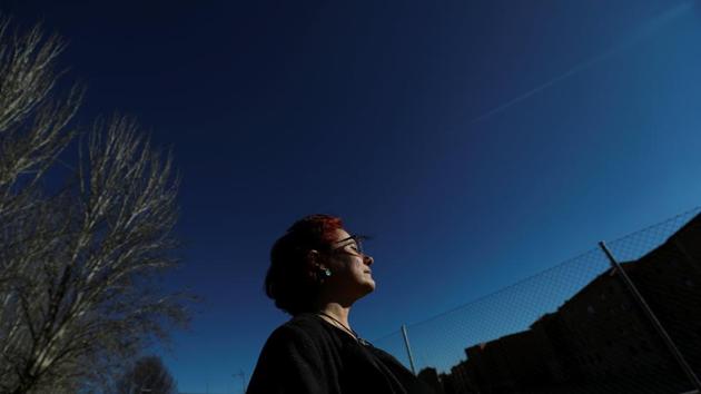 Philosophy teacher Teresa Conde, 52, poses outside the Padre Trinitarios school where she says she was raped by a priest 30 years her senior from the ages of 14 to 16 in Salamanca, Spain. "The rapist went unpunished then and those who covered up go unpunished now," says Conde, who opened up to her family about the rapes when she was 42 after a lifetime of psychological trauma. (Susana Vera / REUTERS)