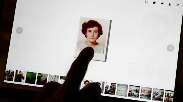 Teresa Conde points at a picture of herself at the age of 15. She says she only started really living when the priest died three years ago. Father Daniel Garcia, a leading clergyman at the time in the area where Conde went to school, corroborated her story to Reuters based on a conversation he had with the priest 10 years ago. (Susana Vera / REUTERS)