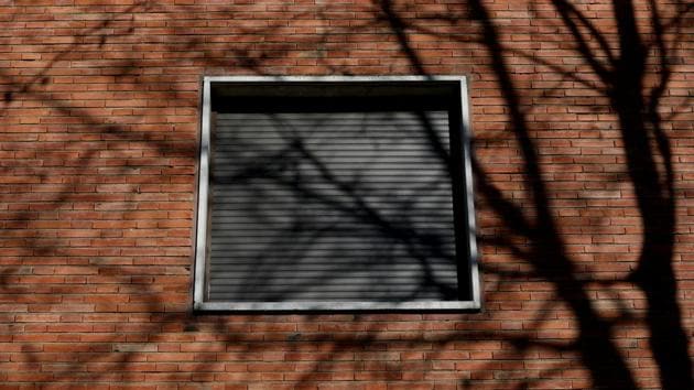 The window of one of the rooms of the Padre Trinitarios school. The government has drafted a bill that would extend the statute of limitations, although not as much as Hurtado proposes. It has not been submitted to parliament. (Susana Vera / REUTERS)