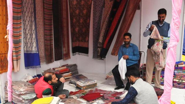 Kashmiri artisans exhibiting their products at a stall in Taj Mahotsav in Agra(Raju Tomar/HT)