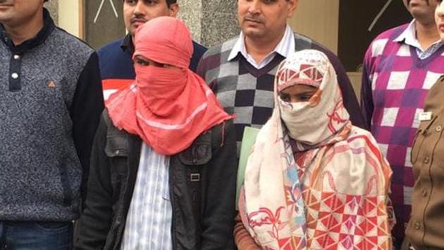 The woman and her brother in police custody. (Sourced Photo) The woman and her brother in police custody. (Sourced Photo)