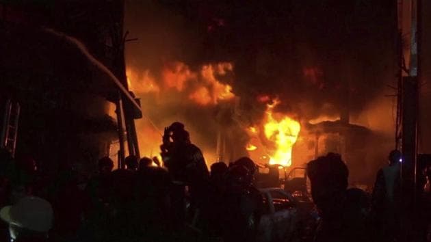 A fast-moving fire swept through adjoining apartment buildings and chemical warehouses in a historic part of the Bangladesh capital Dhaka, killing at least 81 people and injuring several others. (AP) A fast-moving fire swept through adjoining apartment buildings and chemical warehouses in a historic part of the Bangladesh capital Dhaka, killing at least 81 people and injuring several others. (AP)