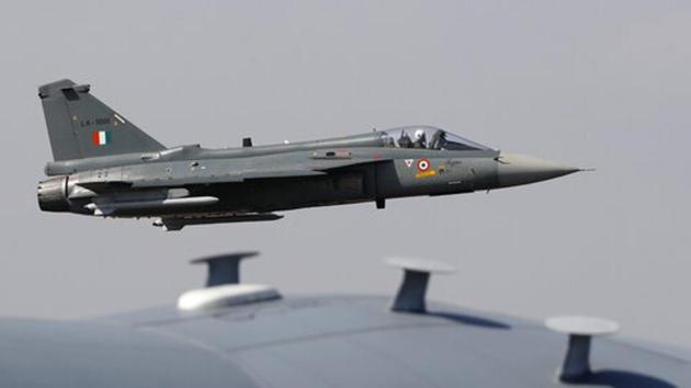 The Tejas aircraft performed air-to-ground attacks and air-to-air refuelling at IAF’s Vayu Shakti air display at Pokhran in Rajasthan on February 16. (AP) The Tejas aircraft performed air-to-ground attacks and air-to-air refuelling at IAF’s Vayu Shakti air display at Pokhran in Rajasthan on February 16. (AP)