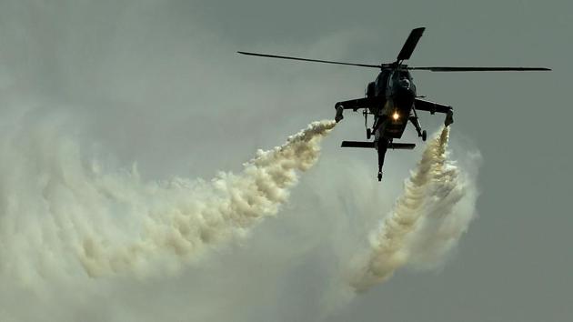 A Light Combat Helicopter (LCH) performs during the inaugural day of the show. (Shashidhar Byrappa / ANI)