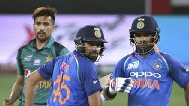 File image of India openers Rohit Sharma and Shikhar Dhawan in action against Pakistan.(AP)