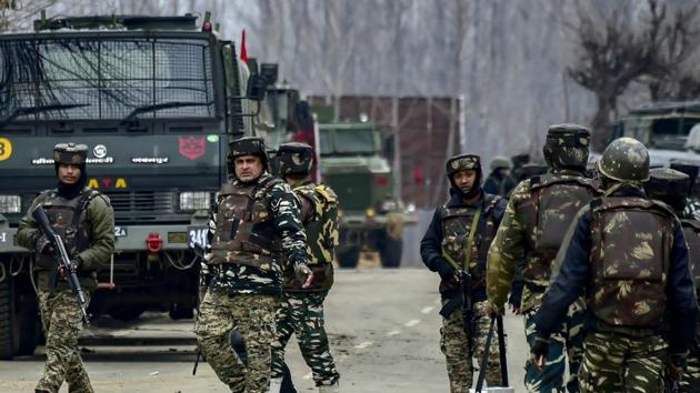 Pulwama: Security forces' personnel sanitize the area during a gunbattle with the militants in which the top commander of the Jaish and Lethpora attack mastermind Kamran was killed along with his associate Hilal Ahmad, a local recruited by the terror group, at Pinglan area of Pulwama in south Kashmir, Monday, February 18, 2019. Four Army personnel, including a Major, were also martyred in the encounter. (PTI Photo/S Irfan) (PTI2_18_2019_000200B)(AP) Pulwama: Security forces' personnel sanitize the area during a gunbattle with the militants in which the top commander of the Jaish and Lethpora attack mastermind Kamran was killed along with his associate Hilal Ahmad, a local recruited by the terror group, at Pinglan area of Pulwama in south Kashmir, Monday, February 18, 2019. Four Army personnel, including a Major, were also martyred in the encounter. (PTI Photo/S Irfan) (PTI2_18_2019_000200B)(AP)