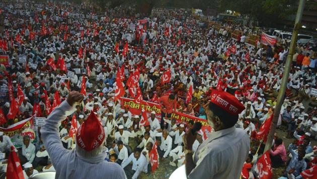 Thousands of farmers began their eight-day protest march on Thursday from Maharashtra’s Nashik to Mumbai to press for their demands, including loan waivers, minimum support price and land rights, 11 months after a similar agitation in the state. The All India Kisan Sabha (AIKS), which has organised the approximately 200 kilometre long march, has said the protest will start even as they are holding talks with the BJP-led government in the state. (Shrikant Gorde / HT File)