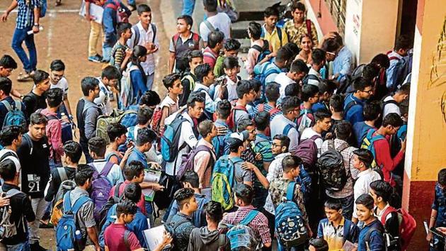 Students enter the hall at Sahyadri Vidya Mandir in Bhandup on Thursday(HT)