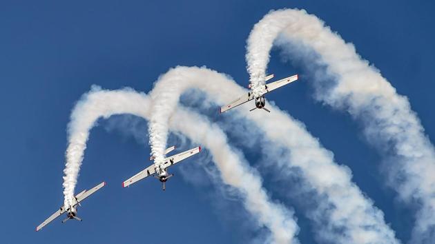 The Yakovlevs aerobatic display team rehearses for the 12th edition of AERO India 2019 at Yelahanka airbase in Bengaluru, Karnataka. (Shailendra Bhojak / PTI) The Yakovlevs aerobatic display team rehearses for the 12th edition of AERO India 2019 at Yelahanka airbase in Bengaluru, Karnataka. (Shailendra Bhojak / PTI)