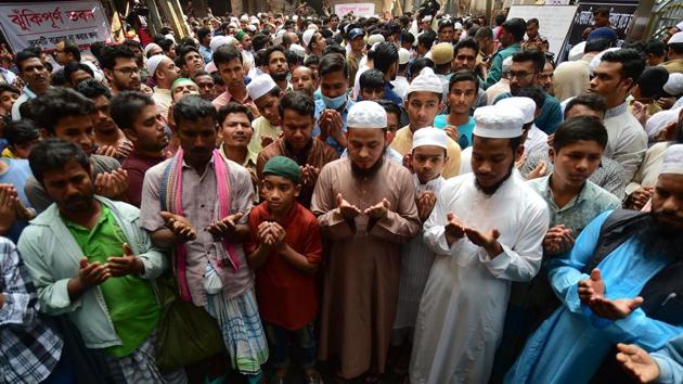 People pray for the victims of the fire. The fire was about 500 metre away from Dhaka’s 18th-century Central Jail, a former Mughal fort where ex-Prime Minister and opposition leader Khaleda Zia has been held since February last year on corruption charges. Since 2016, the jail has only been used to hold opposition figures, and Zia is currently the only inmate. It was not threatened by the fire. (Munir Uz Zaman / AFP)