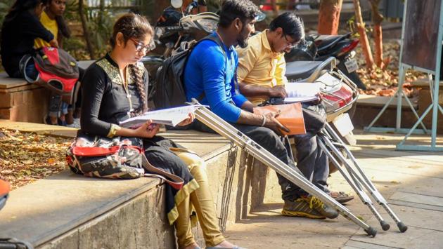 Physically disabled students seen preparing before the examination. (Sanket Wankhade/HT PHOTO) 