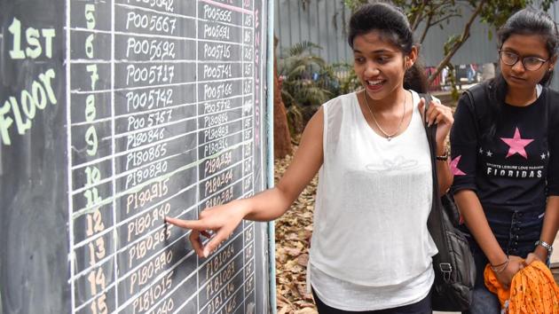Students cross check their seat numbers, at the exam centre minutes before appearing for the first paper, English on Thursday. (Sanket Wankhade/HT PHOTO) 