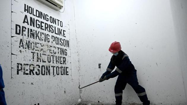 A 20-year-old student armed with a crowbar at the Temper Clinic in Jakarta. (AFP) A 20-year-old student armed with a crowbar at the Temper Clinic in Jakarta. (AFP)
