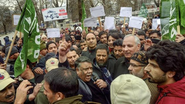 Members of People's Democratic Party (PDP) raise slogans in protest against the harassments of Kashmiris including students following the Pulwama terror attack, in Srinagar on Feb 17.(PTI Photo) Members of People's Democratic Party (PDP) raise slogans in protest against the harassments of Kashmiris including students following the Pulwama terror attack, in Srinagar on Feb 17.(PTI Photo)