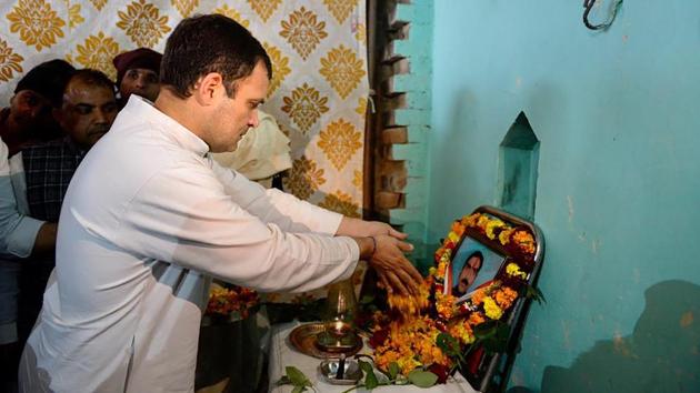 Congress president Rahul Gandhi offers tribute to slain CRPF jawan Pradeep Kumar, who lost his life in the Pulwama terror attack, at his residence in Shamli.(PTI)