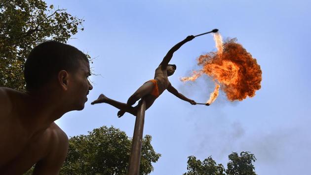 Youngsters perform live Malkhamb stunts during a procession on the occasion of Shivaji Jayanti from Maharastra Sadan to Indira Gandhi National Centre for the Arts (IGNCA) in New Delhi. (Raj K Raj / HT Photo) Youngsters perform live Malkhamb stunts during a procession on the occasion of Shivaji Jayanti from Maharastra Sadan to Indira Gandhi National Centre for the Arts (IGNCA) in New Delhi. (Raj K Raj / HT Photo)