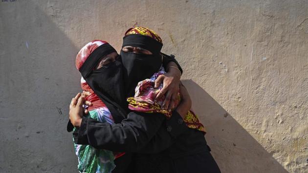 Relatives of victims mourn their loss. In 2014, three people were killed and three others severely burned when a perfume warehouse on the third floor of a building in Chawkbazar caught fire. The following year, a fire gutted eight plastic factories. (Munir Uz Zaman / AFP)