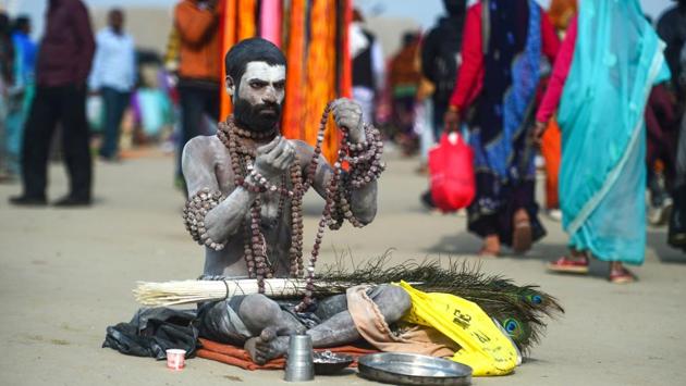 A seer sits on the banks of Sangam -- the confluence of the Ganges, Yamuna and Saraswati rivers -- on the auspicious bathing day of ‘Maghi Purnima’ during the Kumbh Mela festival in Allahabad, Uttar Pradesh. (Sanjay Kanojia / AFP) A seer sits on the banks of Sangam -- the confluence of the Ganges, Yamuna and Saraswati rivers -- on the auspicious bathing day of ‘Maghi Purnima’ during the Kumbh Mela festival in Allahabad, Uttar Pradesh. (Sanjay Kanojia / AFP)