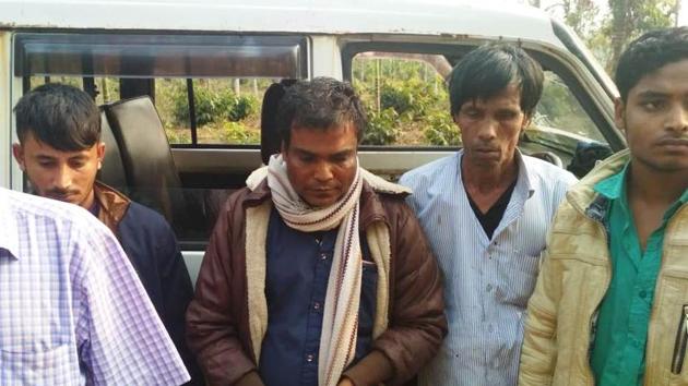 The four Bangladeshi smugglers apprehended by the BSF in Meghalaya’s West Jaiñtia Hills district late Thursday evening. (HT PHOTO) The four Bangladeshi smugglers apprehended by the BSF in Meghalaya’s West Jaiñtia Hills district late Thursday evening. (HT PHOTO)