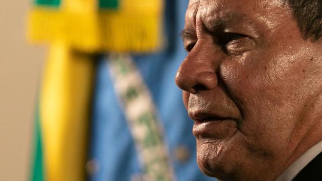 The US has repeatedly said “all options,” including military, are on the table. But Brazilian Vice President Hamilton Mourao dismissed US threats of military intervention in Venezuela as “premature” and said it “wouldn’t make sense.” “I think they’re more in the realm of rhetoric than action,” Mourao said of the threats in an interview with AFP. (Sergio Lima / AFP)