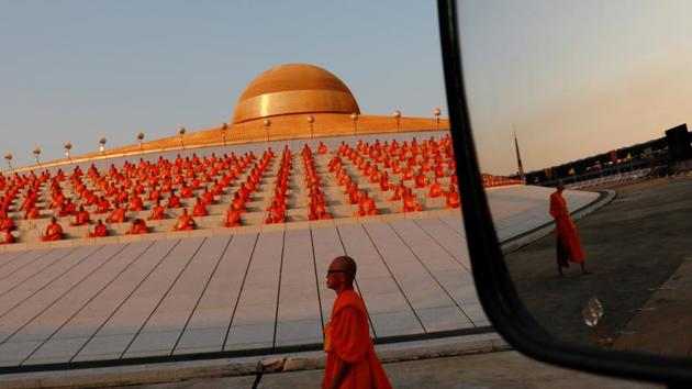 Buddhist monks pray at the Wat Phra Dhammakaya temple during a ceremony to commemorate Makha Bucha Day outside Bangkok, Thailand. (Soe Zeya Tun / REUTERS)
