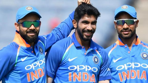 File image of India bowler Jasprit Bumrah (C) celebrating the fall of a wickets with captain Virat Kohli (L) and Shikhar Dhawan. (AFP) File image of India bowler Jasprit Bumrah (C) celebrating the fall of a wickets with captain Virat Kohli (L) and Shikhar Dhawan. (AFP)