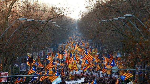 People take part during a rally of Catalan separatist organizations to demonstrate in Barcelona against the trial of Catalan leaders and call for self-determination rights in Barcelona, Spain. Banner reads “Self-determination is not a crime”. (Juan Medina / REUTERS)