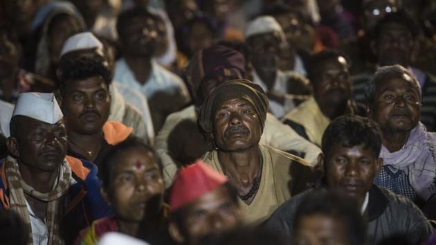 Farmers listen to state water resources minister, Girish Mahajan speak in the Ambe Bahula village. Till late on Thursday, the All India Kisan Sabha (AIKS) — the farmers’ group leading the protest — was in talks with Mahajan over demands including better relief for those hit by drought, revision of the state’s river-linking agreement with Gujarat, and a pension scheme among other things. (Pratik Chorge / HT Photo) Farmers listen to state water resources minister, Girish Mahajan speak in the Ambe Bahula village. Till late on Thursday, the All India Kisan Sabha (AIKS) — the farmers’ group leading the protest — was in talks with Mahajan over demands including better relief for those hit by drought, revision of the state’s river-linking agreement with Gujarat, and a pension scheme among other things. (Pratik Chorge / HT Photo)