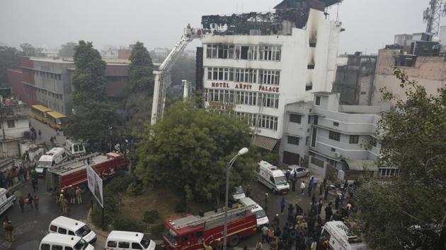 Firefighters seen outside Hotel Arpit Palace after a massive fire broke out at the hotel, at Karol Bagh, in New Delhi, India, on Tuesday, February 12, 2019 (Sanchit Khanna/HT PHOTO) Firefighters seen outside Hotel Arpit Palace after a massive fire broke out at the hotel, at Karol Bagh, in New Delhi, India, on Tuesday, February 12, 2019 (Sanchit Khanna/HT PHOTO)
