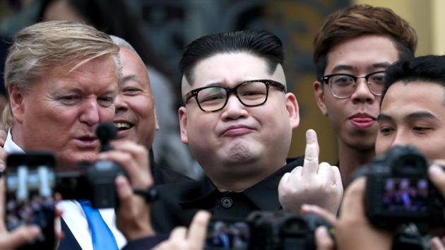 Howard X, an Australian-Chinese impersonator of North Korean leader Kim Jong Un and Russell White, who is impersonating US President Donald Trump, pose for a photo outside the Opera House, ahead of the upcoming Trump-Kim summit in Hanoi, Vietnam. (Athit Perawongmetha / REUTERS)