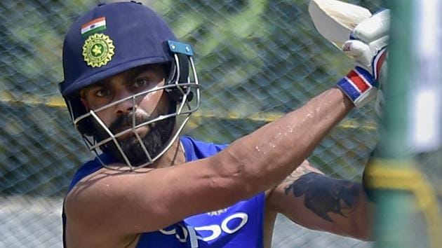 Virat Kohli at a practice session ahead of their first T20 international series cricket match against Australia. (PTI) Virat Kohli at a practice session ahead of their first T20 international series cricket match against Australia. (PTI)