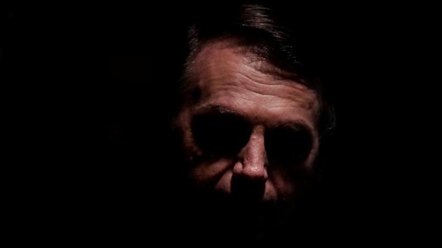 Brazil’s President Jair Bolsonaro arrives at an inauguration ceremony of the new president of the Parliamentary Agricultural Front (FPA) in Brasilia, Brazil. (Ueslei Marcelino / REUTERS)