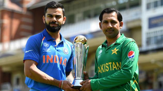 File image of India skipper Virat Kohli with Pakistan captain Sarfraz Ahmed. (Getty Images) File image of India skipper Virat Kohli with Pakistan captain Sarfraz Ahmed. (Getty Images)