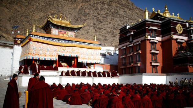 Tibetan monks attend a ceremony at the Labrang Monastery ahead of “Sunbathing Buddha Festival”, in Xiahe county, Gansu Province, China. (Aly Song / REUTERS)