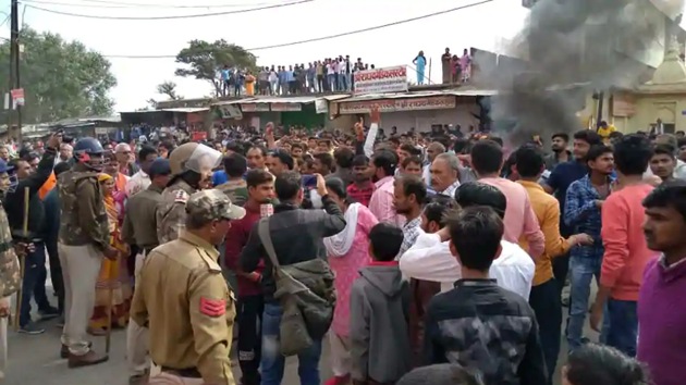 Soon after the bodies were recovered, locals staged a protest against the failure of the police to save the twin boys. (HT PHOTO)