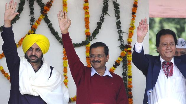 Aam Aadmi Party national convenor Arvind Kejriwal (centre), Harmohan Dhawan (right) and MP Bhagwant Mann during a rally in Chandigarh on Sunday.(Anil Dayal/HT) Aam Aadmi Party national convenor Arvind Kejriwal (centre), Harmohan Dhawan (right) and MP Bhagwant Mann during a rally in Chandigarh on Sunday.(Anil Dayal/HT)