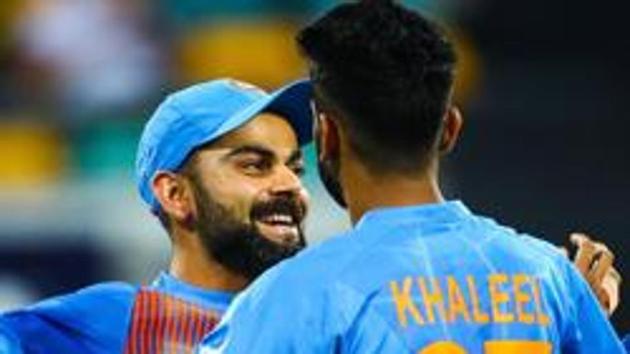 Virat Kohli (L) congratulates teammate Khaleel Ahmed on dismissing Australia's batsman D'Arcy Short. (AFP) Virat Kohli (L) congratulates teammate Khaleel Ahmed on dismissing Australia's batsman D'Arcy Short. (AFP)