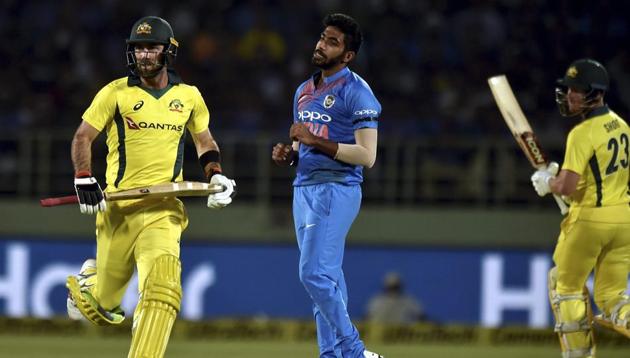 Australia's Glenn Maxwell and D'Arcy Short take a run against India during the first T20 international cricket match between India and Australia at the Dr YS Rajasekhara Reddy ACA–VDCA Cricket Stadium in Vizag(PTI)