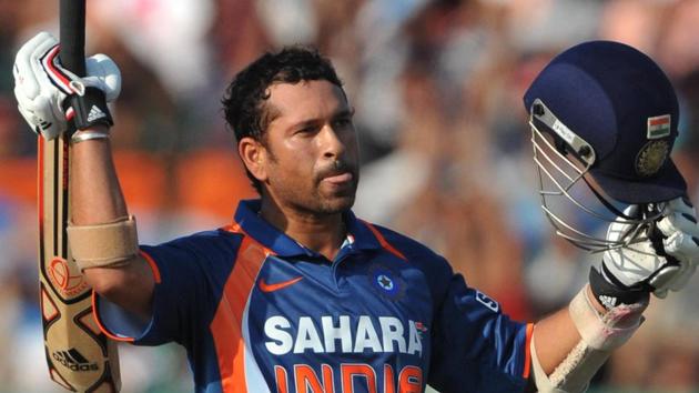 Sachin Tendulkar celebrates his 100 during the 2nd ODI between India and South Africa at Captain Roop Singh Stadium on February 24, 2010 in Gwalior.(Getty Images)