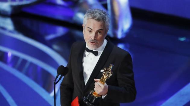 91st Academy Awards: Alfonso Cuaron accepts the Foreign Language Film award for Roma.(REUTERS)