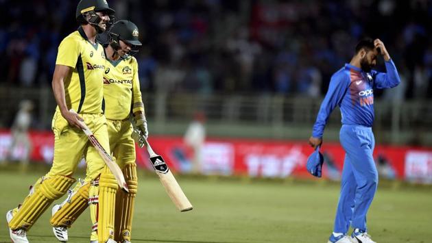 Pat Cummins and Jhye Richardson scored 14 off the final over as Australia scraped home off the final ball of the match (PTI) Pat Cummins and Jhye Richardson scored 14 off the final over as Australia scraped home off the final ball of the match (PTI)