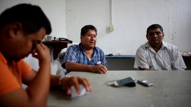 Fisherman Manuel de la Cruz (C) speaks during an interview. “What we want is for them not to damage the lagoon,” said de la Cruz, a leading local fisherman, who has worked the waterway since he was eight years old. He said he delivered a document to Lopez Obrador in December saying fishermen want more than just “crumbs” of government support. (Alexandre Meneghini / REUTERS) Fisherman Manuel de la Cruz (C) speaks during an interview. “What we want is for them not to damage the lagoon,” said de la Cruz, a leading local fisherman, who has worked the waterway since he was eight years old. He said he delivered a document to Lopez Obrador in December saying fishermen want more than just “crumbs” of government support. (Alexandre Meneghini / REUTERS)