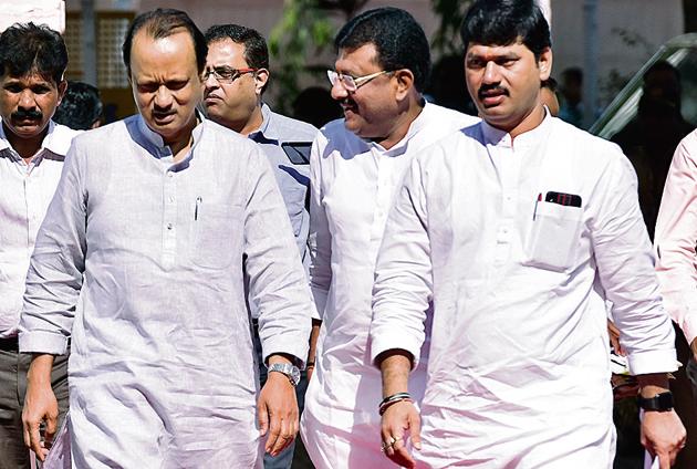 NCP leaders Ajit Pawar and Dhananjay Munde on the first day of the budget session at Vidhan Bhavan on Monday.(Anshuman Poyrekar/HT Photo)