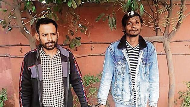 Arbaz Khan (left) and Noor Mohammad in police custody.(Handout) Arbaz Khan (left) and Noor Mohammad in police custody.(Handout)
