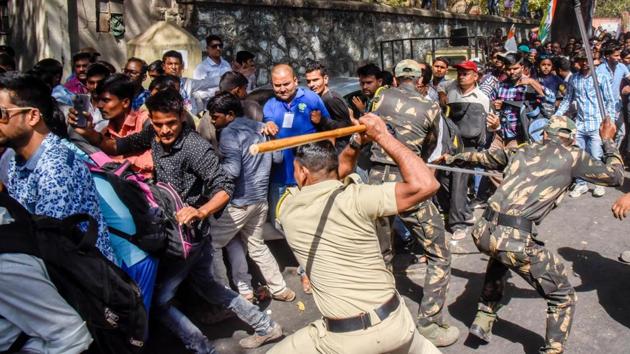 Deaf youth protesting in the city on Monday against the issuance of disability certificates to ineligible persons were subject to a baton charge, allege organisers. The police, however, claim it was “mild force” to restrain the protestors at the social welfare commissionerate in Bund Garden. (SANKET WANKHADE/HT PHOTO) 