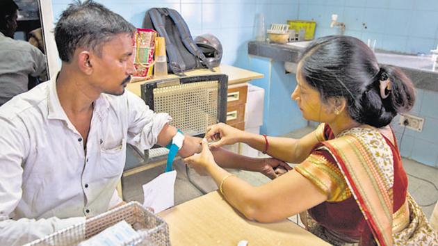 A medical professional draws blood from a patient to be tested. Image for representation.(AP file photo)