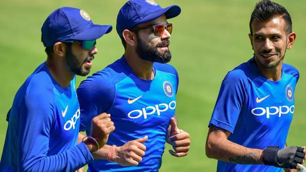 Virat Kohli with teammates Jasprit Bumrah and Yuzvendra Chahal during a practice session. (PTI) Virat Kohli with teammates Jasprit Bumrah and Yuzvendra Chahal during a practice session. (PTI)