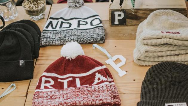 Menswear experts recommend the best beanies and other winter hats.(Unsplash)