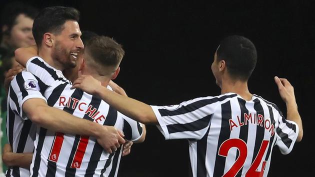 Newcastle United's Fabian Schar, left, celebrates scoring his side's first goal of the game with team mates. (AP) Newcastle United's Fabian Schar, left, celebrates scoring his side's first goal of the game with team mates. (AP)